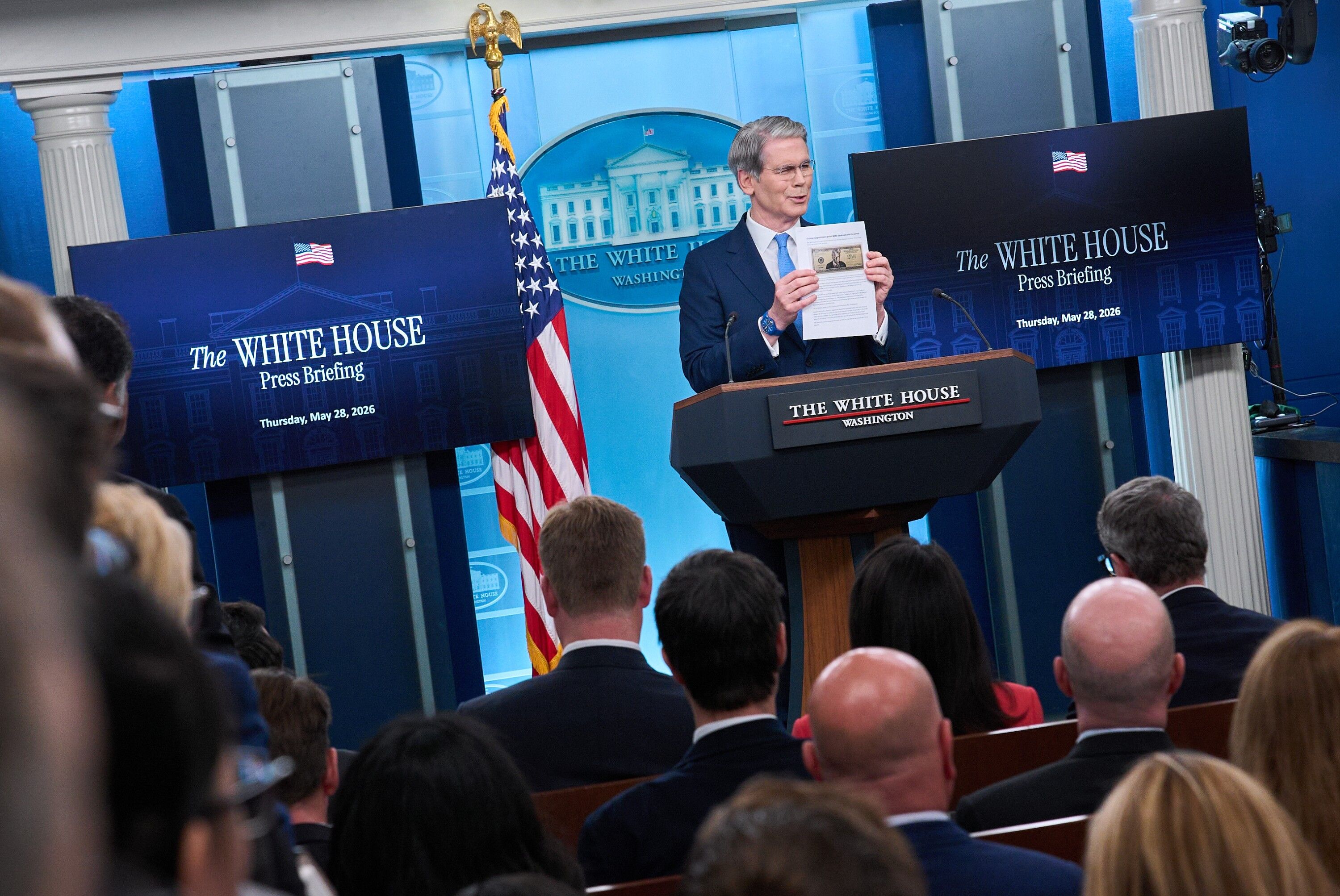 Treasury Secretary Scott Bessent holds up an image of the proposed 250 dollar bill, while speaking to reporters in the James Brady Press Briefing Room at the White House, Thursday, May 28, 2026, in Washington. (AP Photo/Jacquelyn Martin)