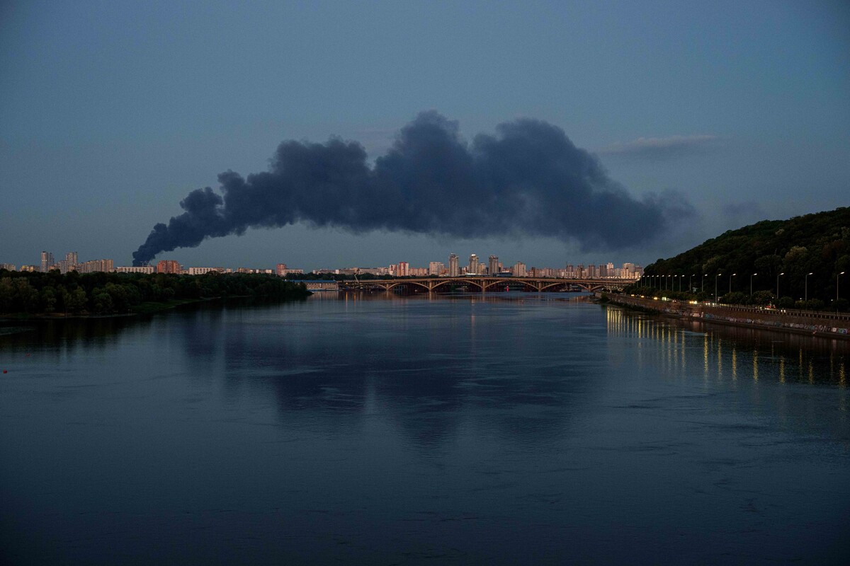 Smoke rises over the city center after a Russian attack on Kyiv, Ukraine, Thursday, June 25, 2026. (AP Photo/Evgeniy Maloletka)